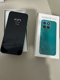 هاتف HONOR X8c جديد بلون أخضر أنيق، لم يُستخدم إلا لمرة واحدة فقط. الش...