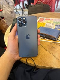 ايفون 12 برو ماكس ذاكرة 512  نموذج M بطارية 89 شرط ما يعبر هوى  ضد الم...