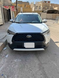 تويوتا كورلا كروس 2024 وارد صيني  السيارة مكفولة من الصبغ او البارد  ر...