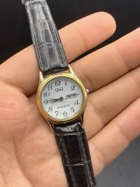 Q&Q ياباني • نسائي • اصلي