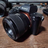 سوني A7ii..... M2 نضافه 90% شتر 22 عدسه 50m....... 1.8 ملحقات كرتونه  ...