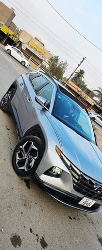 توسان فول  الفول هايبرد مرقم بغداد بسمي موديل 24 بعدها زيرو ماشيه ٥الا...