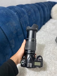 عدسة 70-300 • شاحن • رانية السليمانية