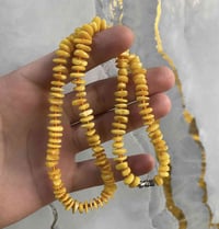 عقد كهرب بولوني • ١٥ غرام • بغداد