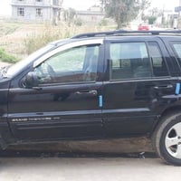 اخوان جيب شيروكي لمتدد للمراوس فقط موديل 2000 رقم بغداد  8سلندر بلاد ك...