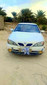 سياره نيسان ٢٠٠١  رقم قادسيه مميز سياره وضع الشركه مامحوره مكفوله من ا...