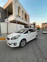 كارنز ٢٠١٤ خليجي بأسمي بغداد بيها صبغ باب خلفي وصندوك مكاني بغداد ٠٧٧١...