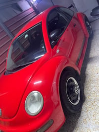 للبيع السياره مديل 2001 بيتل السياره ماشيه 90000 كيلو مكانها الشرطه ال...