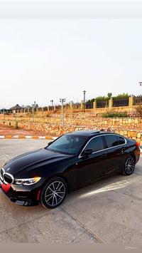 Bmw330i 2022 //24.500$ دفع خلفي ماشية76.000 كيلو رقم الشاصي 3MW5R1J01N...