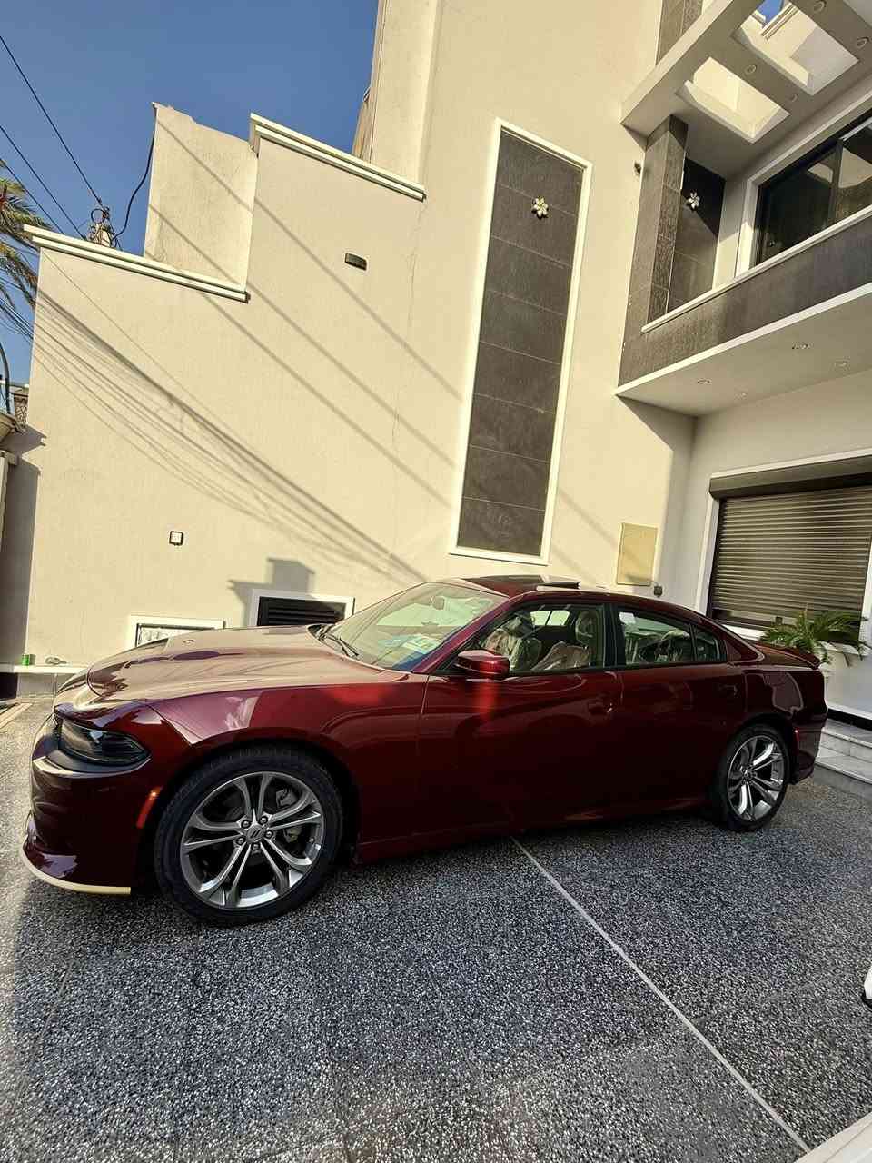 جارجر GT PLUS . وكالة هارلم
الموديل :2022  . (خليجي) . 
العداد : 10 الاف كيلو متر  
المحرك : V6.  3.6L .

المواصفات :
* نسخة  GT PLUS - SUPER TRACK PAK.
* نقطة عمياء . 
* مصابيح أمامية زنون . 
* كشافات الضباب زنون . 
* المصابيح الأمامية مع LED . 
* حساسات . 
* شاشه كبيرة مع نظام ملاحة نفكيشن GPS .
* الشاشة مع اوپشنات SRT . 
* سستم صوت الپاين .
* ويل قياس 20 انج . 
* فتحت سقف (سلايد) . 
* مقاعد جلد رياضية . 
* مقاعد أمامية كهربائية عدد 2 . 
* ذاكرة لحفظ وضعيات الجلوس (ميموري) . 
* مقاعد أمامية تبريد وتدفئة . 
* مقاعد خلفية تدفئة . 
* تشغيل عن بعد . 
* ستيرن كهربائي . 
* تدفئة ستيرن . 
* محدد سرعة . 
* تلفون بلوتوث . 
* كاميرا خلفية .
* مرايا متحسسة للاضاءة العالية .
* كير شفتر بالستيرن . 
* دخول ذكي (بصمة)
السيارة جديدة بمعنى الكلمة اخت الزيرو 

السعر 340 
للأستفسار : 
***********
