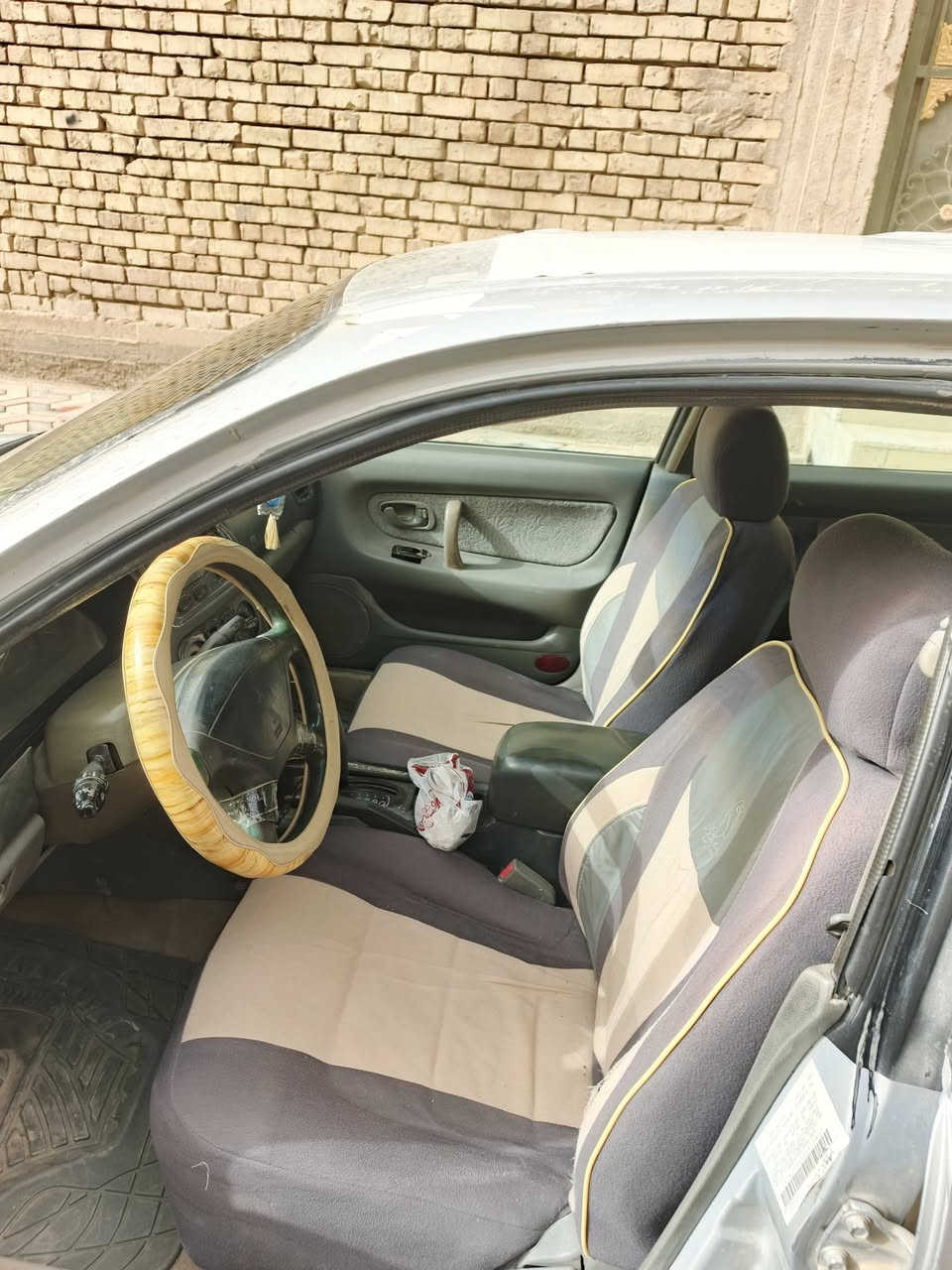 سيارة ميتسوبيشي ياباني 
موديل 98  محور كورلا 1800 رقم بغداد
 كير ومحرك مكفولات 
للاستفسار على الرقم ***********
