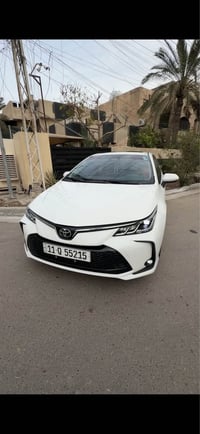 كورلا هايبرد 2025  ماشية 7000km السعر 153وبيها مجال بسيط داخل احمر فول...