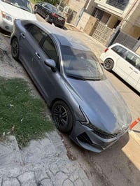 للبيع K5 موديل 2023 وارد امريكي   عليه غرمات ٦ ملاين كلهن رادار حزام و...