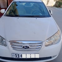 النترا 2011 خليجي ابيض (الشركه العامه) ماشيه ٩٨ الف مع زياده رقم بغداد...