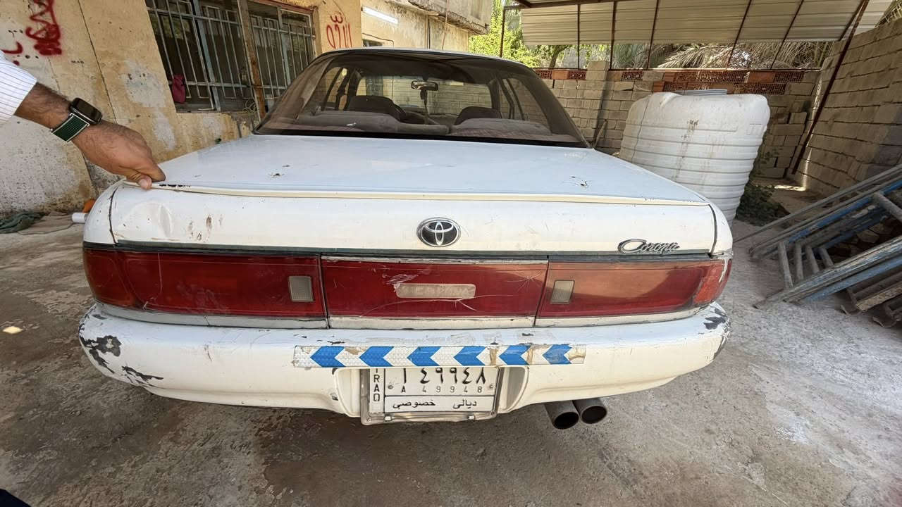 تيوتا كورونا موديل ١٩٩٣  صبغ حزام بدون حادث سيارة نضيفة و خير من الله رقم الماني شرط التحويل سعر  ٢٦ و بيهة مجال     رقم الهاتف *********** ماكني ديالى
