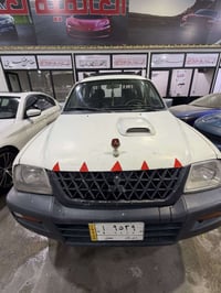 ميتسوبيشي بيك اب • ٢٠٠٣ • رقم ذي قار