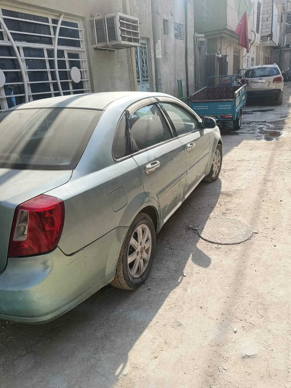 موديل 2007 بلادية. بس شبر صبغ.  مكينة وكير وتبريد خير من الله السعر. 65 وبيها مجال ***********. باسمي. رقم بغداد.
