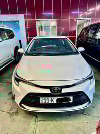 كورلا موديل ٢٠٢٥ ماشيه الف و٨٠٠ فقط فول ١/١ كراسي كهرباء داخل جلد احمر...