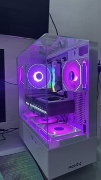 رايزن 5 7600X • سافاير RX 9060 XT 16GB • 16GB DDR5 6000MHz