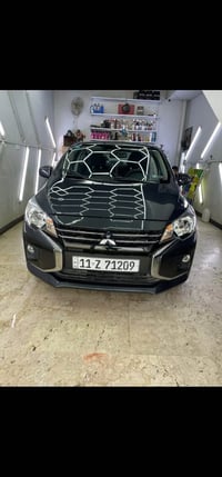 متسيوبيشي ميراجg4 موديل 2024بلاتينيوم ماشيه 22000 ميل فقط  رقم بغداد د...