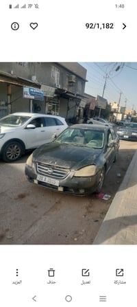 سياره نيسان لتما 2005رقم نجف نكليزي سعرها ٢٨ وبيها مجال هذا رقمي وتساب...