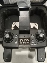 درون رباعية شغالة ١٠٠٪بدون اي نقص غراضه كاملة بطارية عدد٢ لا اعرف استع...