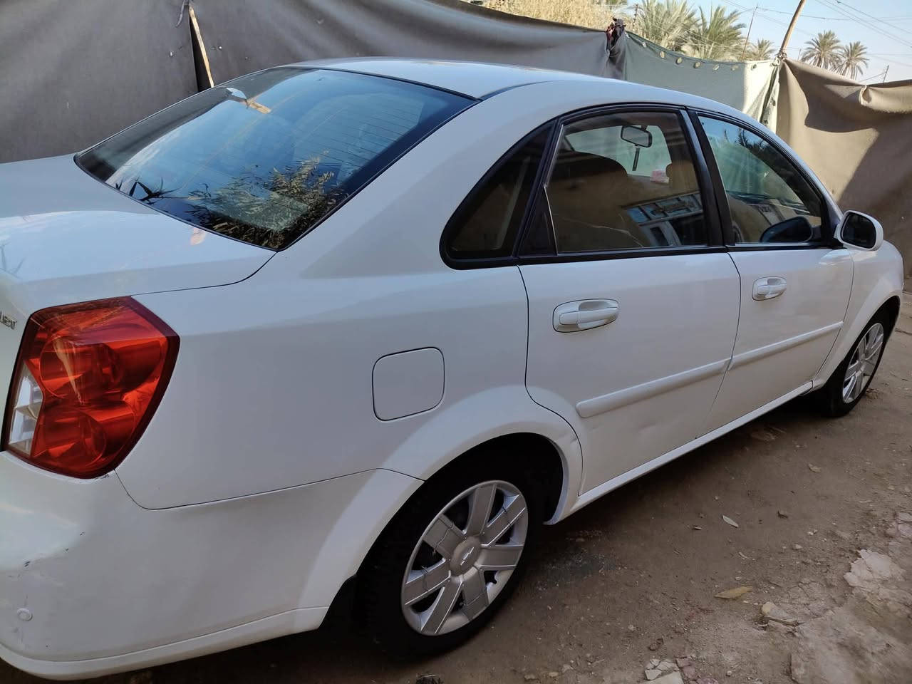 اوبترا موديل 13رقم كربلاء السونار مرفق بالصور السعر 82 وبيهه مجال قليل للشراي  *********** مكان السياره كربلاء طريق طويرج كربلاء
