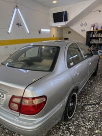 نيسان صني • ٢٠٠٣ • صبغ عام