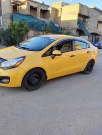 كيا ريو • ٢٠١٤ • رقم بغداد