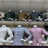 ملكان نص • ملابس