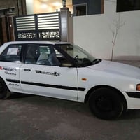 مازدا ٣٢٣ • ١٩٩١ • تك باب