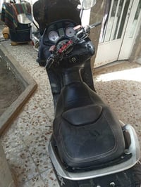 تي ماكس • مكفول • بابل مركز