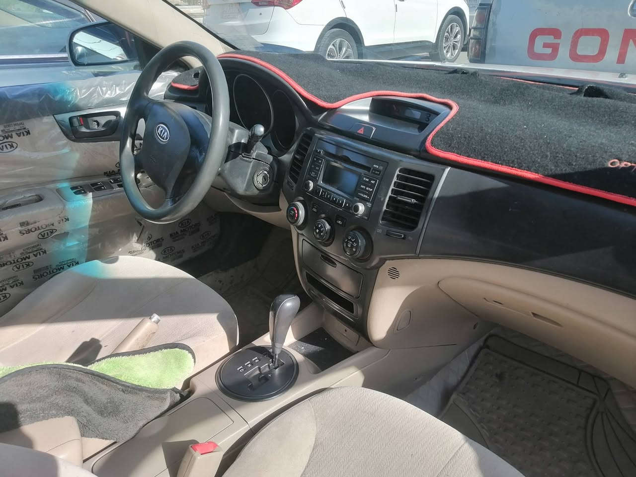 كيا اوبتيما ٢٠٠٩ خليجي اللون ابيض ثلجي رقم ذي قار بأسمي السياره..  العنوان.
ذي قار/الرفاعي.
كير ومكينه وتبريد شغال... 
السياره حسب فحص السونار
 معمرة...(بيهه تچيه) 
السعر. 82 وبيها مجال   ***********
