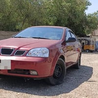 أوبترا 2004 • شيفروليه أوبترا • سيارة كير عادي • تبريد شغال • صبغ حزام...