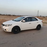 KIA سيراتو للبيع   موديل 2013  رقم بغداد  السيارة بيه تخم تاير جديد   ...