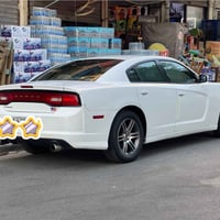 چارجر 2014 بغداد ب اسمي السيارة نص فول شاشه كبيرة كامرة خلفية  غرفة سي...