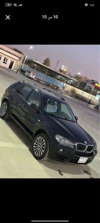 بي ام دبليو اكس فايف موديل 2008 بيها باب السائق صبغ فقط مكينة وكير لكز...