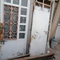 باب حديد ثقيل • جرجوبه