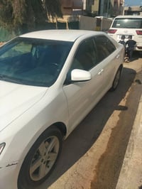 كامري 2012 قطعه وحده صبغ بدون دواخل رقم جديد  فئة LE محرك وكير بشرط شر...