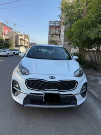 سبورتج موديل ٢٠٢١ خليجي مكينة 2000 كفالة من الصبغ بيها بارد بالباب الخ...