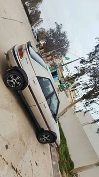 مازدا ٣٢٣ • محرك ١٦ • رقم كركوك