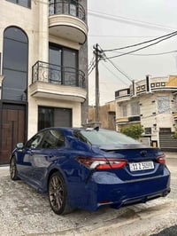 كامري 2023 وارد امريكي SE رقم بغداد الدولي باسمي السيارة جديدة بمعنى ا...