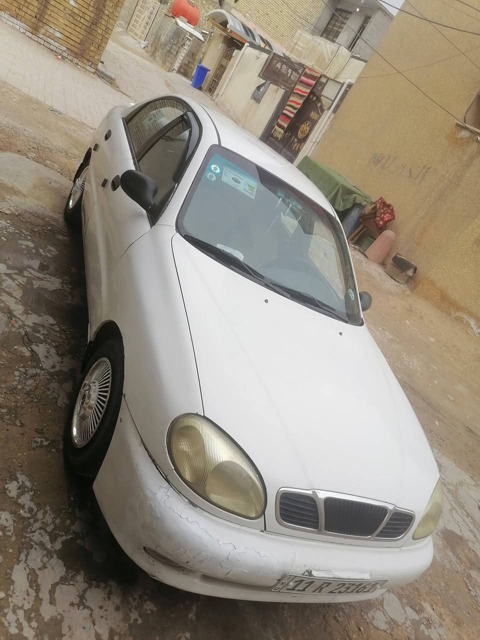 السلام عليكم للبيع دايو لانوس موديل 1998 رقم بغداد مكينه وكير جدد صدر امامي خلفي جديد مكفولة من الضربه والتبديل  تبريد شغال سنويه 2028باسمي مكان بغداد السعر 31 وبيها مجال بسيط رقم الهاتف ***********
