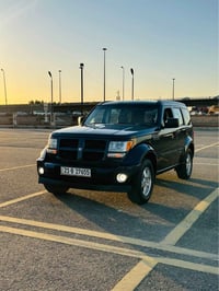 للبيع دوج نترو موديل 2008. ماشيه 92  وارد امريكي صبغ قطعه وحده فقط بني...