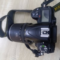 نيكون D7000 • كامرة • قابلة تفاوض