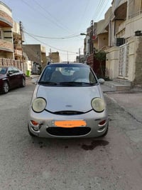 وبركاته سياره كيو كيو للبيع اللون رصاصي والرقم الجديد بغداد السياره جي...