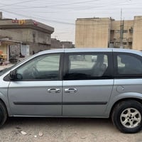 دوج كرفان 2006 لون ازرق شذري السيارة بأسمي  تبريد شغال شرط ثلج تخم تاي...