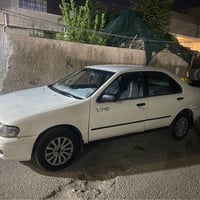 نيسان صني  رقم بغداد أنكليزي محرك جديد مال قطع  تبريد ثلج تايرات زينه ...