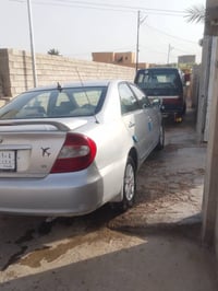 كامري ٢٠٠٣ • محرك ٦ • رقم بغداد