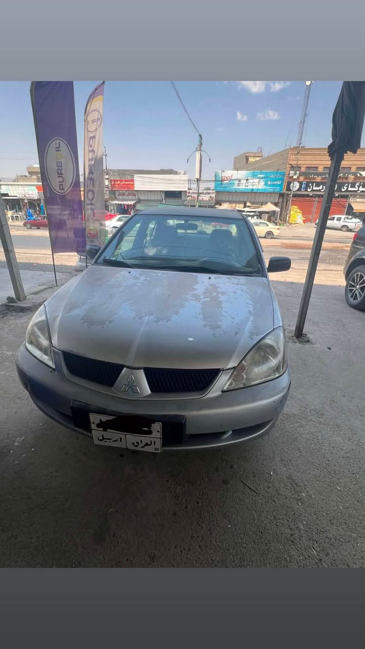 لانسەر مۆدیل ٢٠٠٩ تۆماتیک  گێر و مەکینە تەبرید بە شەرت سەنەوی و ھەزەی بەسەرچووە رەقم کۆن دوو پارچەی تەنیا ساردە کوتە رەقم موبایل ***********.  ھەولێر Singapore
